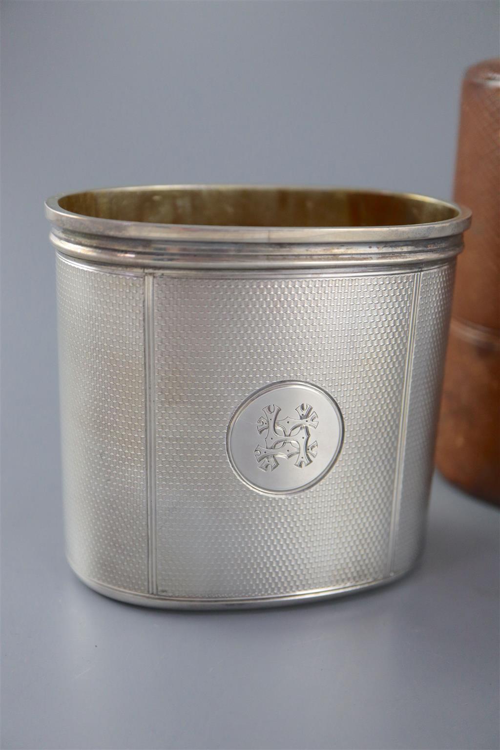 A leather cased Victorian travelling silver hip flask and warmer, by Thomas Johnson I,